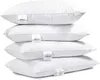 A stack of four white pillows against a white background. Produktbild-Vorschau