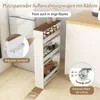 A narrow shelving unit with jars and candles on top, placed next to a refrigerator and a kitchen counter. Produktbild-Vorschau