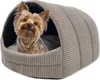 A small dog sits inside a cozy, igloo-shaped pet bed. Produktbild-Vorschau
