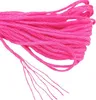 A close-up view of a bundle of pink embroidery floss. Náhled obrázku produktu