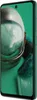 A smartphone with a green case, displaying a close-up of an astronaut's helmet on its screen. Náhled obrázku produktu