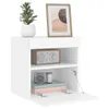 A white cabinet with a plant and framed picture on top, and a radio and camera inside. Produktbild-Vorschau