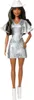 A Barbie doll wearing a silver glittery cowgirl outfit and white boots. Produktbild-Vorschau