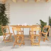 An outdoor patio setting with a wooden table and chairs. Náhľad obrázku produktu