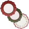 Three Christmas-themed plates are arranged diagonally on a white background. Anteprima dell’immagine prodotto