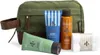 A men's grooming kit with a toiletry bag and various products. Produktbild-Vorschau