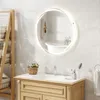 A modern bathroom vanity with a round LED mirror above it. Náhled obrázku produktu