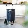 A shopping trolley with a black bag and silver frame is shown in a kitchen setting. Anteprima dell’immagine prodotto