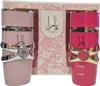 Two perfume bottles, one pink and one hot pink, are displayed in front of a pink patterned box. Voir les images du produit