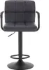A black bar stool with a tufted seat and backrest, on a white background. Produktbild-Vorschau