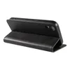 A black leather flip case for a smartphone is shown from the side, propped open to stand the phone. Produktbild-Vorschau