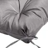 A close-up view of a gray cushion with ties. Produktbild-Vorschau