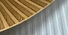 A close-up view of a decorative wall panel with a wood grain pattern. Produktbild-Vorschau