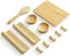 A collection of bamboo sushi-making tools laid out on a white background. Produktbild-Vorschau