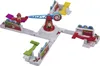 A toy game with a central spinning mechanism and arms extending outwards, each with a platform and a character. Produktbild-Vorschau