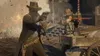 Two cowboys in a shootout, with explosions and debris in the background. Produktbild-Vorschau