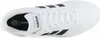 A top-down view of a white Adidas sneaker with black stripes. Anteprima dell’immagine prodotto