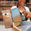 A person is using a smartphone with a wallet case to make a payment at a terminal. Produktbild-Vorschau