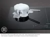 A close-up of a black induction cooktop with a pot overflowing with foam on it. Produktbild-Vorschau