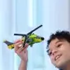 A child holding a toy helicopter. Anteprima dell’immagine prodotto
