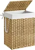 A woven laundry basket with a white liner and a lid. Produktbild-Vorschau