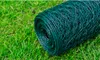 A roll of green wire mesh fencing lies on a bed of green grass. Náhled obrázku produktu