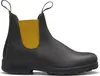 A single brown leather Blundstone boot with yellow elastic side panels, shown from the side against a white background. Voir les images du produit