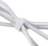 A close-up view of white cables secured by a white velcro strap. Produktbild-Vorschau