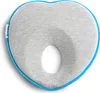 A top-down view of a heart-shaped baby pillow with a hole in the center, on a white background. Podgląd zdjęcia produktu