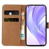 A brown flip-case wallet for a smartphone, with cards and banknotes inserted. Produktbild-Vorschau