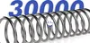 A close-up of a metal spring with large blue numbers in the background. Produktbild-Vorschau