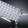A close-up, angled view of a chrome silver keyboard with transparent keycaps. Produktbild-Vorschau