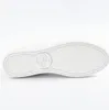 The sole of a white sneaker is shown against a white background. Produktbild-Vorschau