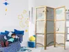 A child is lying on a bed in a room decorated with space-themed wall decals. A room divider with a cloudy night sky pattern is placed next to the bed. Anteprima dell’immagine prodotto