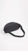 A black fanny pack is shown against a white background. Produktbild-Vorschau