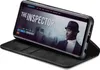 A black flip cover case for a Samsung Galaxy S10+ phone, showing the phone screen displaying a movie titled 'The Inspector'. Produktbild-Vorschau