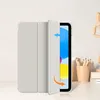 A tablet case is shown on a desk with a tablet inside. Anteprima dell’immagine prodotto