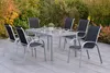 An outdoor patio setting with a dining set. Produktbild-Vorschau