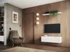 A modern living room with a TV mounted on a wooden wall, a lowboard, a chair, and a door. Náhľad obrázku produktu