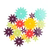 A collection of colorful gears arranged in a cluster on a white background. Podgląd zdjęcia produktu