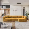 A modern living room with a large sectional sofa, a coffee table, and a bookshelf. Produktbild-Vorschau