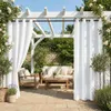 An outdoor patio area with a pergola, furniture, and white curtains. Náhled obrázku produktu