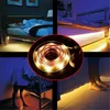Collage of images showing LED light strips used for ambient lighting around beds and a crib. Anteprima dell’immagine prodotto