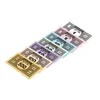 A collection of Monopoly money bills of different denominations, arranged diagonally on a white background. Produktbild-Vorschau