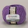 A ball of purple yarn with a label. Produktbild-Vorschau