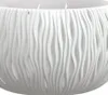 A close-up view of a white, textured planter. Voir les images du produit
