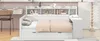 A modern white daybed with storage drawers and a shelf unit above, set in a room with a pink wall and a desk with a chair. Produktbild-Vorschau
