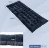 A dark blue mattress pad with dimensions indicated. Produktbild-Vorschau