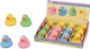 A display box of colorful rubber ducks, with a few ducks also shown outside the box. Anteprima dell’immagine prodotto