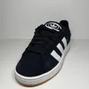 A studio shot of a single Adidas Campus 00S J shoe. Voir les images du produit